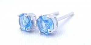 New blue topaz studs in sstcjewelry.com Gemspression line. Double gallery setting wrapping the stone girdle tightly